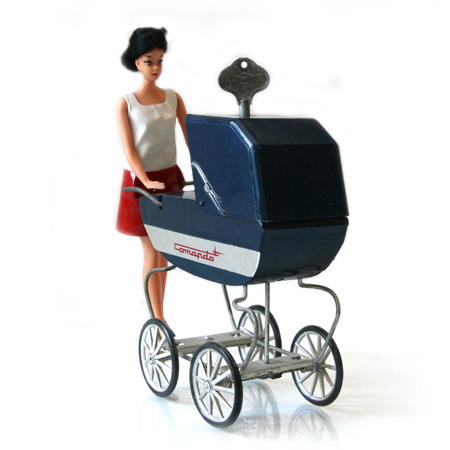 Barbie doll with Comando baby carriage